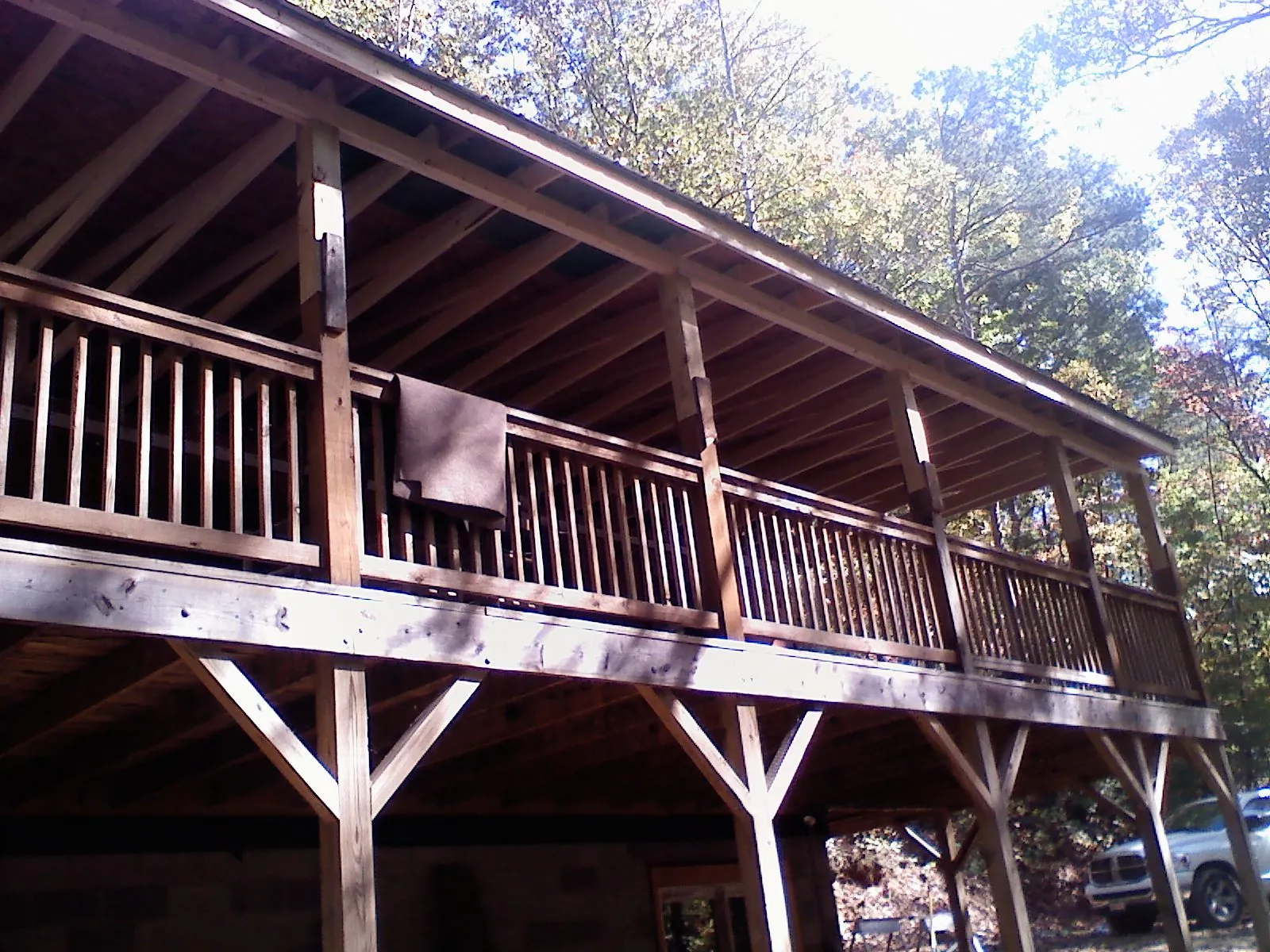 Timber framing under a new elevated porch and deck — Roof Leak Repair in Goleta by Roofing Brothers